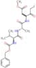N-[(benzyloxy)carbonyl]-L-valyl-N-[3-fluoro-1-(2-methoxy-2-oxoethyl)-2-oxopropyl]-L-alaninamide