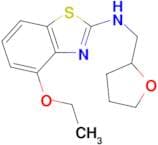 4-ethoxy-N-(tetrahydrofuran-2-ylmethyl)-1,3-benzothiazol-2-amine