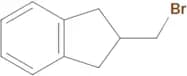 2-(Bromomethyl)-2,3-dihydro-1H-indene