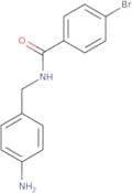 N-[(4-Aminophenyl)methyl]-4-bromobenzamide