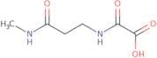 {[2-(Methylcarbamoyl)ethyl]carbamoyl}formic acid