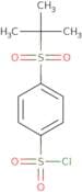 4-(2-Methylpropane-2-sulfonyl)benzene-1-sulfonyl chloride