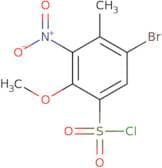 5-Bromo-2-methoxy-4-methyl-3-nitrobenzene-1-sulfonyl chloride