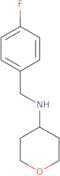 N-[(4-Fluorophenyl)methyl]oxan-4-amine
