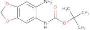 tert-Butyl N-(6-amino-1,3-dioxaindan-5-yl)carbamate