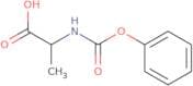 2-[(Phenoxycarbonyl)amino]propanoic acid