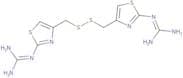 Bis-[[2-[(diaminomethylene)amino]thiazol-4-yl]methyl]disulfide