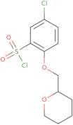 5-Chloro-2-(oxan-2-ylmethoxy)benzene-1-sulfonyl chloride