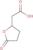 2-(5-Oxooxolan-2-yl)acetic acid