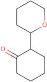 2-(Oxan-2-yl)cyclohexan-1-one