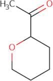 1-(Oxan-2-yl)ethan-1-one
