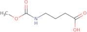 4-[(Methoxycarbonyl)amino]butanoic acid