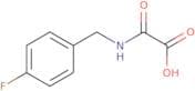 {[(4-Fluorophenyl)methyl]carbamoyl}formic acid