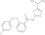 2-[(4-Fluorophenyl)methoxy]-N-[5-(propan-2-yl)-1,3,4-thiadiazol-2-yl]benzamide