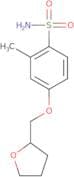 2-Methyl-4-(oxolan-2-ylmethoxy)benzene-1-sulfonamide
