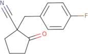1-[(4-Fluorophenyl)methyl]-2-oxocyclopentane-1-carbonitrile