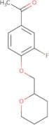 1-[3-Fluoro-4-(oxan-2-ylmethoxy)phenyl]ethan-1-one