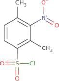 2,4-Dimethyl-3-nitrobenzene-1-sulfonyl chloride