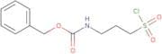 (3-Chlorosulfonyl-propyl)-carbamic acid benzyl ester