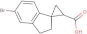 5'-Bromo-2',3'-dihydrospiro[cyclopropane-1,1'-indene]-3-carboxylic acid
