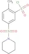 2-Methyl-5-(piperidine-1-sulfonyl)benzene-1-sulfonyl chloride