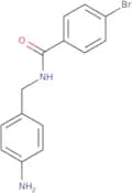 N-[(4-Aminophenyl)methyl]-4-bromobenzamide
