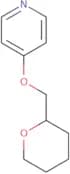 4-(Oxan-2-ylmethoxy)pyridine