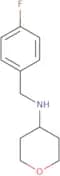 N-[(4-Fluorophenyl)methyl]oxan-4-amine