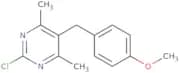 2-Chloro-5-[(4-methoxyphenyl)methyl]-4,6-dimethylpyrimidine