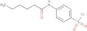 4-Hexanamidobenzene-1-sulfonyl chloride
