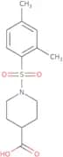 1-(2,4-Dimethylbenzenesulfonyl)piperidine-4-carboxylic acid