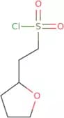 2-(Oxolan-2-yl)ethane-1-sulfonyl chloride