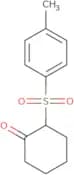 2-(4-Methylbenzenesulfonyl)cyclohexan-1-one