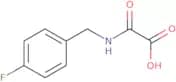 {[(4-Fluorophenyl)methyl]carbamoyl}formic acid