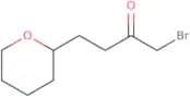 1-Bromo-4-(oxan-2-yl)butan-2-one