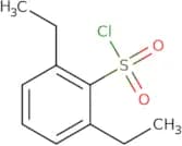 2,6-Diethylbenzene-1-sulfonyl chloride