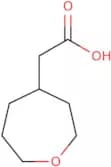 2-(Oxepan-4-yl)acetic acid
