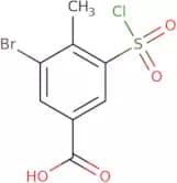3-Bromo-5-(chlorosulfonyl)-4-methylbenzoic acid