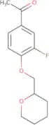 1-[3-Fluoro-4-(oxan-2-ylmethoxy)phenyl]ethan-1-one