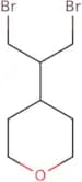 4-(1,3-Dibromopropan-2-yl)oxane