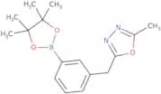 2-Methyl-5-{[3-(tetramethyl-1,3,2-dioxaborolan-2-yl)phenyl]methyl}-1,3,4-oxadiazole