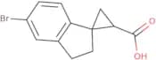 5'-Bromo-2',3'-dihydrospiro[cyclopropane-1,1'-indene]-3-carboxylic acid