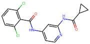 2,6-Dichloro-N-(2-(cyclopropanecarboxamido)pyridin-4-yl)benzamide