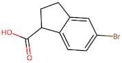 5-Bromo-2,3-dihydro-1H-indene-1-carboxylic acid