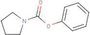 Phenyl pyrrolidine-1-carboxylate