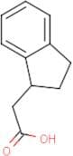 2-(2,3-Dihydro-1H-inden-1-yl)acetic acid