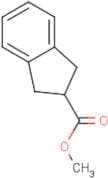 2-Methoxycarbonyl-indane
