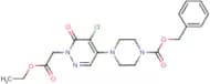 4-[5-Chloro-1-(2-ethoxy-2-oxoethyl)-6-oxo-1,6-dihydropyridazin-4-yl]piperazine, N1-CBZ protected