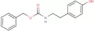 Benzyl N-[2-(4-hydroxyphenyl)ethyl]carbamate