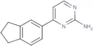 4-(2,3-Dihydro-1H-inden-5-yl)pyrimidin-2-amine